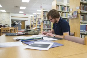 Student studying in the Garnett Library