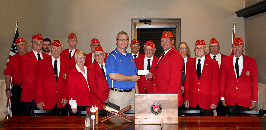 THE GREATER OZARKS MARINE CORPS League Detachment No. 1184 in West Plains recently donated $1,000 to Missouri State University-West Plains’ new Veterans Center, which will be housed in Hass-Darr Hall when it opens in spring 2018. The center provides a variety of services to veterans, their spouses or dependents who can receive educational assistance through the G.I. Bill. On hand for the check presentation were, from left, Marines Michael Harper, David Duncan, Jacob Wilbanks, Jerome Quinn, Mike Strong, Marge Kesling, Newt Brill and George Myers; Missouri State-West Plains Director of Development Joe Kammerer; and Marines Bob Lang, Jack McNevin, Kurt Wilbanks, Carla Boze, Dorman Frazier, Doug Boze and Wendell Ward. Marine Robert Jones also attended the presentation. (Missouri State-West Plains Photo)