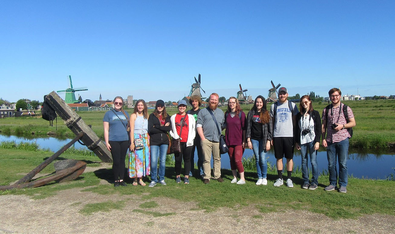 MEMBERS OF THE DARR Honors Program at Missouri State University-West Plains posed for a group photo at the Zaanse Schans in the Netherlands during their short-term study away trip in May to Europe. The historical community serves as an “outdoor museum” to preserve the traditional windmills for which the country is known. They also visited Paris, France. From left are students Madison Knight, Salem; Blair Cook, Plato; Kaitlyn Jones, Nixa; Gretta Phillips, Winona; Weston Phipps, West Plains; Darr Honors Program Director Alex Pinnon and his wife, Trista; Rosemary Driscoll, Brandsville; Will Tillman, Thayer; Destiny Johnson, Bakersfield; and Brett Lair, West Plains. (Missouri State-West Plains Photo)