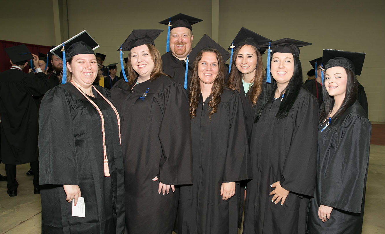 THESE STUDENTS in Missouri State University-West Plains’ Associate of Science in Nursing (ASN) degree program were all smiles before the 2017 commencement ceremony in May, during which the program graduated its 1,000th student. From left are ASN graduates Kayla Trail, Dora; Rebecca Brockelbank and Carlton Patillo, both of West Plains; Donna Green, Willow Springs; Hannah Brewer, Myrtle; Hailey Shinberger, West Plains; and Erika Chitwood, Winona. (Missouri State-West Plains Photo)