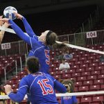 GRIZZLY GRACE STUMBAUGH (No. 5) pushes the ball over the net during a recent match. (Missouri State-West Plains Photo)