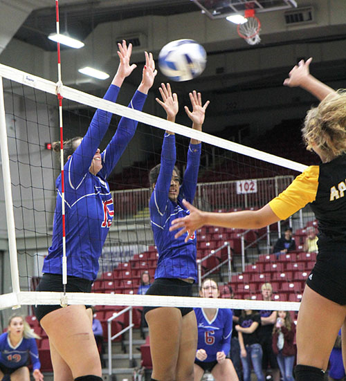 FRESHMAN OUTSIDE HITTER Karolina Noszczyk (No. 15) and freshman middle attacker Keziah Williams (No. 8) try to block a hit by a Tyler Junior College attacker during Friday’s game between the two teams at the Grizzly Invitational Tournament. (Missouri State-West Plains Photo)