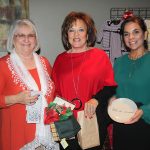 THREE WEST PLAINS RESIDENTS won giveaways at the Friends of the Garnett Library’s annual fall fashion show fundraiser Friday, Nov. 17, at the West Plains Country Club, which was hosted by The Kloz Klozet and Cleea’s At Home Market. From left, Sally Watkins received fingerless gloves from The Kloz Klozet, Linda Gould received a gift basket of various items including Sweet Tooth candy, and Danette Albino received a Christmas plate from Cleea’s At Home Market. Proceeds from the event will go toward ongoing needs at the Garnett Library. (Missouri State-West Plains Photo)