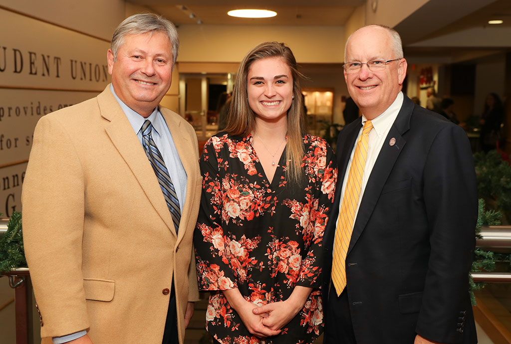 MICAELA WIEHE, center, West Plains, a May 2016 graduate of Missouri State University-West Plains and a senior at Missouri State-Springfield, was one of six students who received the 2017-18 Citizen Scholar Award presented Thursday, Dec. 14, by the Missouri State University Board of Governors. The award, established in fall 2007, is given annually to students “who exemplify the concept of a citizen scholar,” university officials said. With Wiehe above are Missouri State-West Plains Chancellor Drew Bennett, left, and Missouri State University System President Clif Smart.  (Missouri State-West Plains Photo)