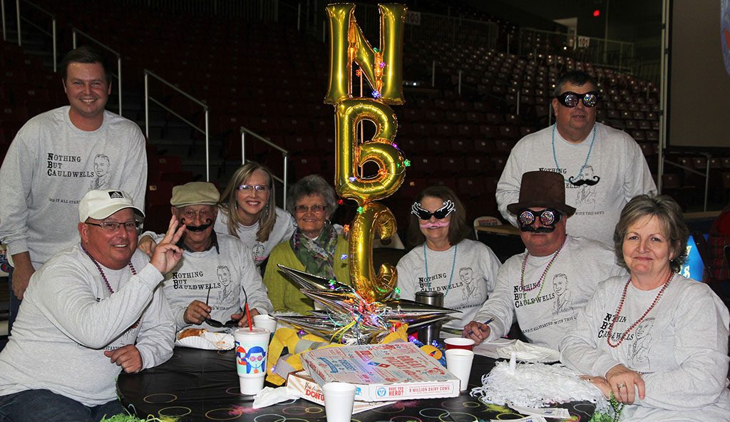 “NBC – NOTHING BUT CAULDWELLS” was the theme of this table which placed third in the table-decorating contest of the 15th annual Trivia Night benefitting Grizzly Athletics at Missouri State University-West Plains Jan. 27 at the West Plains Civic Center. Team members included, seated from left around the table, Jack, Jack Sr. and Gayla Cauldwell; Sue Brian; and Natalie, Michael and Shelly Cauldwell. Standing from left, Trey and Kirby Cauldwell. (Missouri State-West Plains Photo)