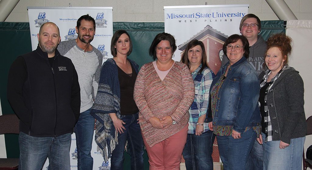 THE TEAM West Plains Bank and Trust Company placed third in the 15th annual Trivia Night contest benefitting Missouri State-West Plains Grizzly Athletics Jan. 27 at the West Plains Civic Center. From left are members Brandon Blake, Jeremy Norberg, Courtney Richardson, Penny Gann, Melanie Reid, Cheryl Finley, Zachary Davis and Stephanie Riggs.  (Missouri State-West Plains Photo)