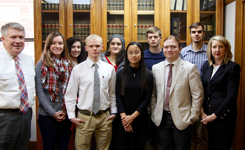 Front row from left above are 37th Judicial Circuit Court Judge David Evans; students Alexis Barber of West Plains, Chris Harms of Alton, Anna Muecke and Aaron Barton of West Plains; and AuBuchon. Back row: Students Carlea Badolain and Callie Scheck of West Plains, Sage Clunn of Ava, and Michael Wright of Thayer. (Missouri State-West Plains Photo)
