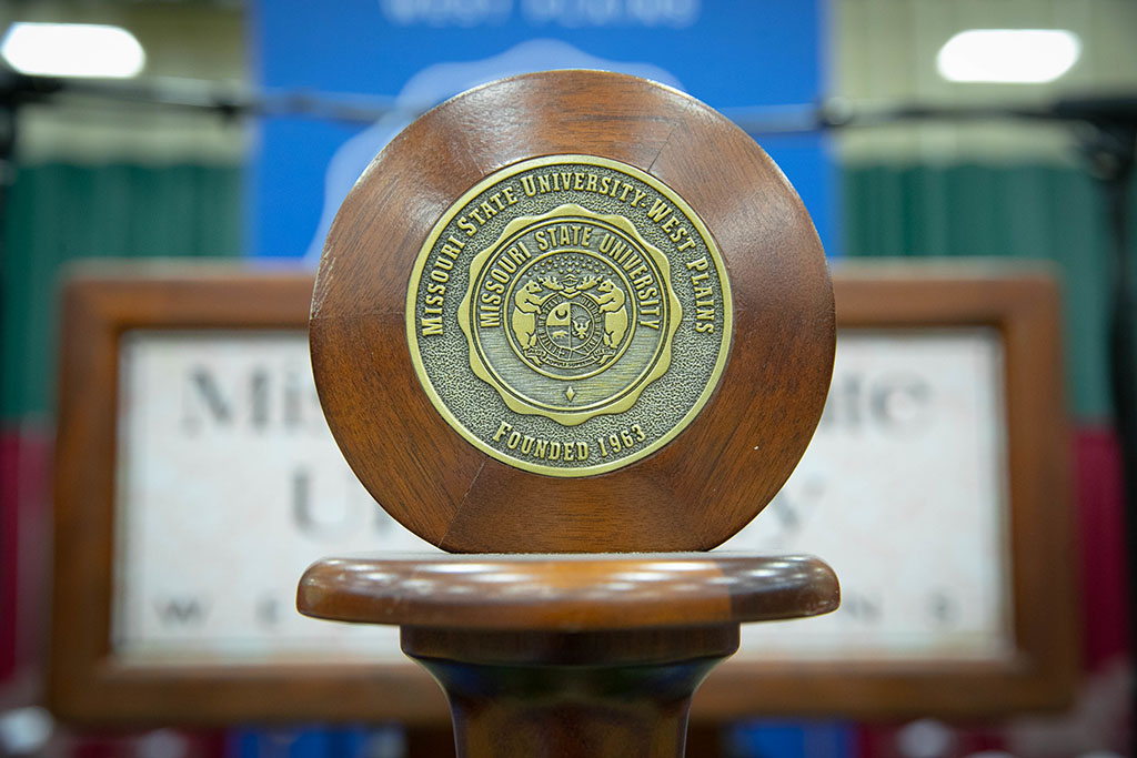 The mace stands in front of the podium at the 2018 commencement ceremony.
