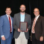 President Biff Williams, C.J. Collins, and Scot Scobee